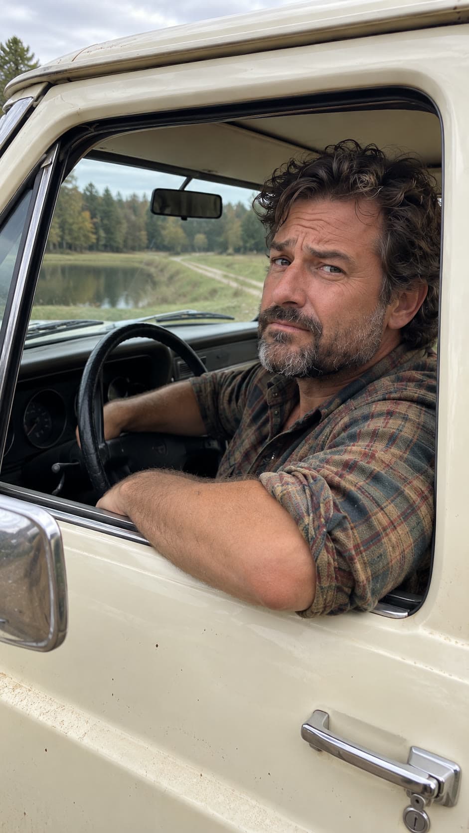 Original fictional driver leaning from an open cream pickup window and looking skeptically at the phone camera